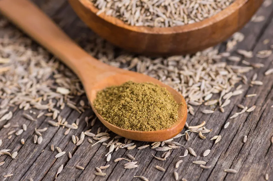cuillere avec du cumin en poudre